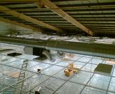 Installation of ducting above a suspended ceiling