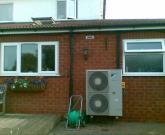 Outdoor Daikin altherma evaporator in rear garden